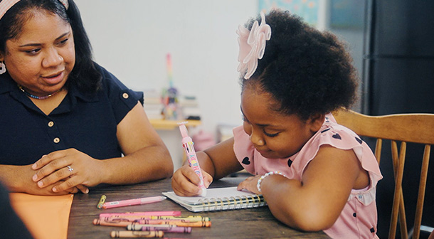 Now, when she feels sad or frustrated, she draws her feelings in a notebook that Mrs. Patricia gave her.
